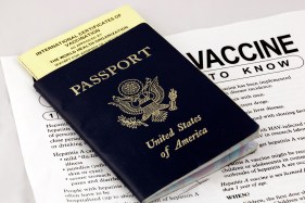 vaccines needed for travel showing passport and health record